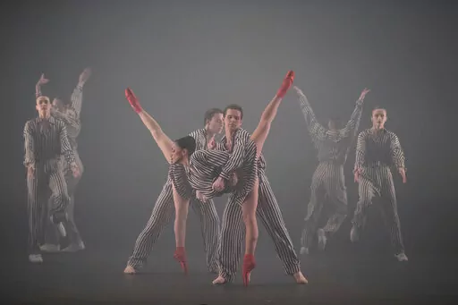 In this photo provided by New York City Center, dancers appear in "Twyla Tharp: In the Upper Room & Nine Sinatra Songs" at New York City Center on Oct. 19, 2022, in New York. (Christopher Duggan/New York City Center via AP)