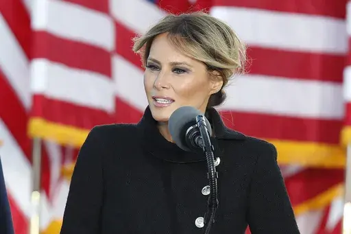 First lady Melania Trump speaks to a small group of supporters at Andrews Air Force Base, Md., Jan. 20, 2021. (AP Photo/Luis M. Alvarez, File)