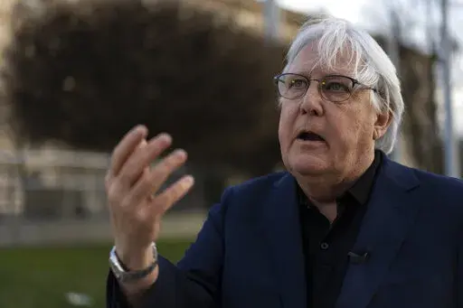 Martin Griffiths, Under-Secretary-General for Humanitarian Affairs and Emergency Relief Coordinator, speaks with The Associated Press during an interview in Kyiv, Ukraine, Thursday, April 7, 2022. The United Nations’ humanitarian chief said Thursday he's not optimistic about securing a ceasefire to halt the fighting in Ukraine, following high-level talks in Moscow and Kyiv that underscored how far apart the two sides are. (AP Photo/Rodrigo Abd)