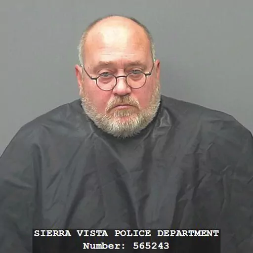 This 2016 photo provided by the Sierra Vista, Ariz., Police Department shows David Frodsham. Frodsham pleaded guilty to sex abuse charges in 2016 and is serving a 17-year sentence. But records reviewed by the AP show that the U.S. Army and the state of Arizona missed or ignored multiple red flags over more than a decade, which allowed Frodsham to allegedly abuse his adopted son and other children for years, all the while putting national security at risk. (Sierra Vista Police Department via AP)